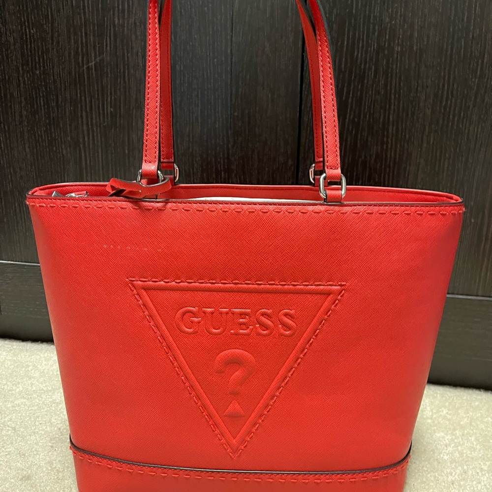 Brand new Guess bag with tag intact.